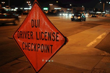 Sign that reads, "DUI Driver License Checkpoint."