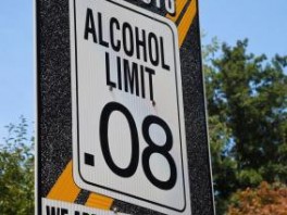 Sign that says "Alcohol Limit .08"